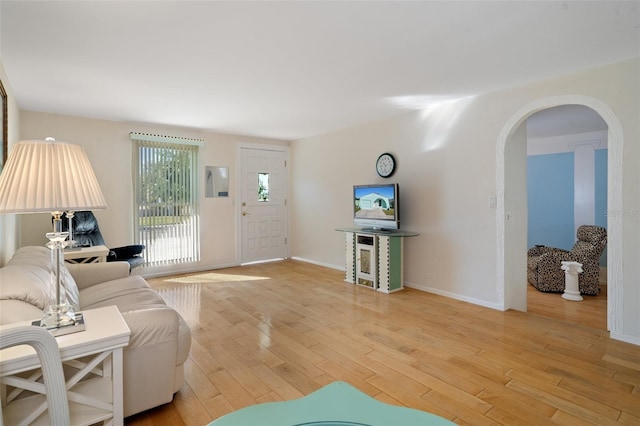 living room with light hardwood / wood-style floors