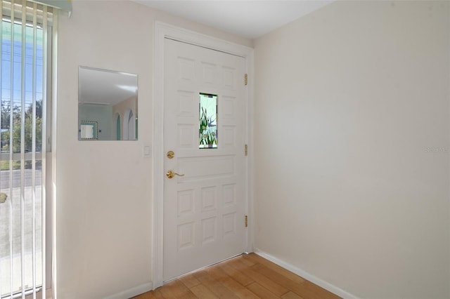 doorway featuring light hardwood / wood-style floors