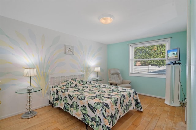 bedroom with light wood-type flooring