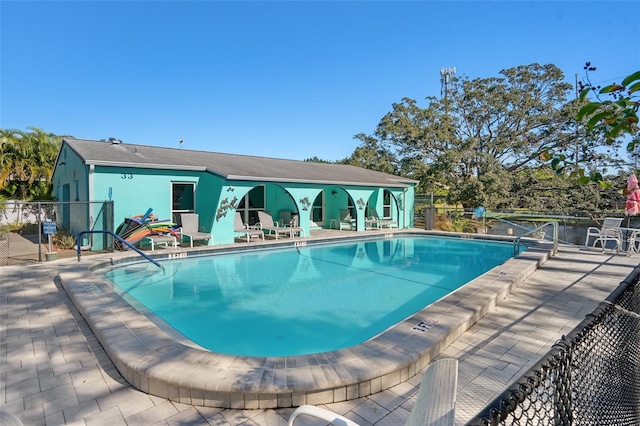 view of pool with a patio area