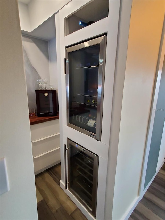 interior space with wine cooler and hardwood / wood-style floors