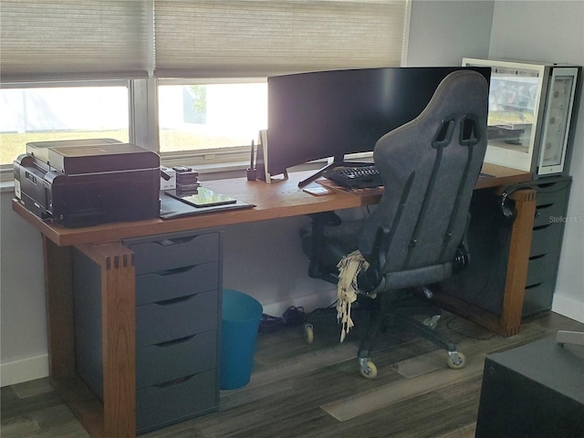 home office with hardwood / wood-style flooring