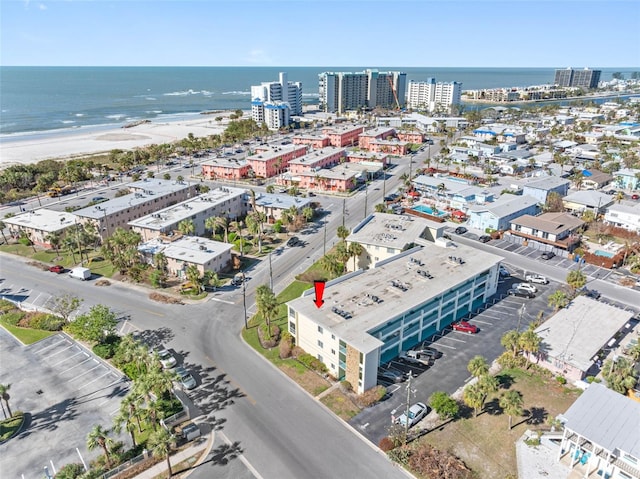 aerial view featuring a beach view and a water view