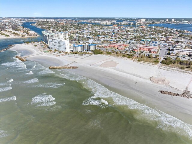 bird's eye view featuring a beach view and a water view