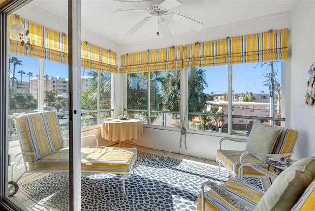 sunroom / solarium with ceiling fan