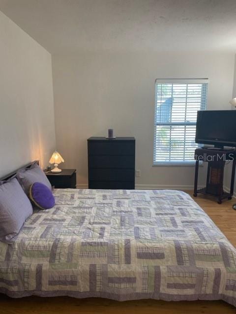 bedroom featuring light hardwood / wood-style flooring