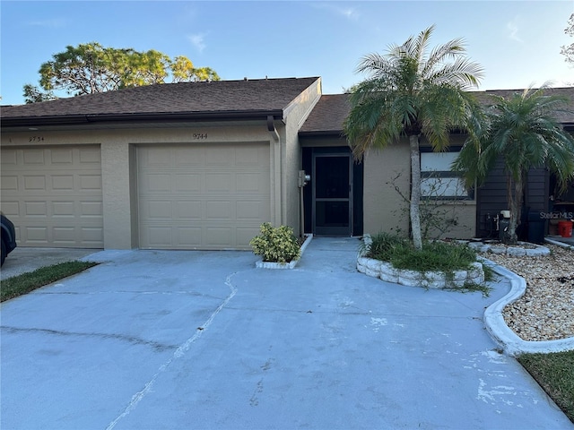 single story home with a garage