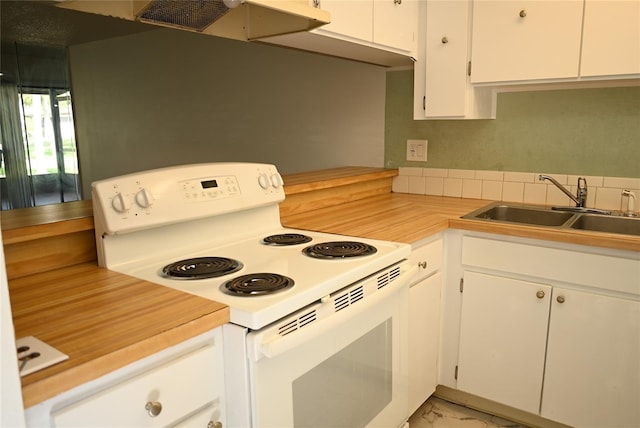 kitchen with white cabinets, white electric range oven, and sink