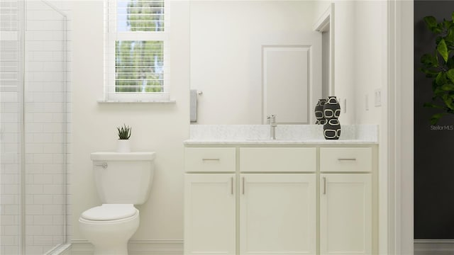 bathroom featuring vanity, toilet, and an enclosed shower