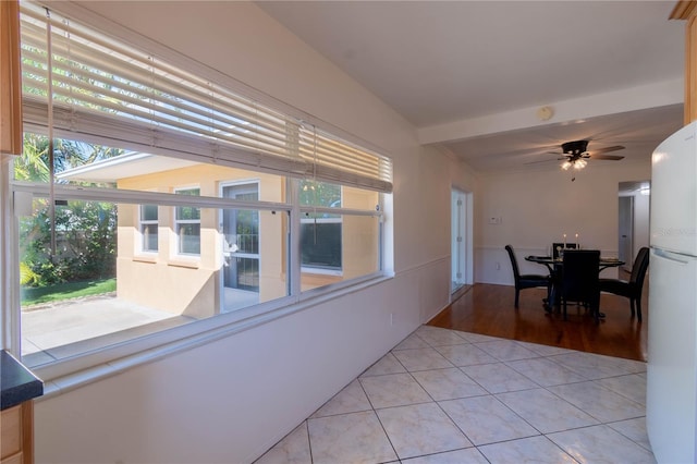 hall with light hardwood / wood-style floors