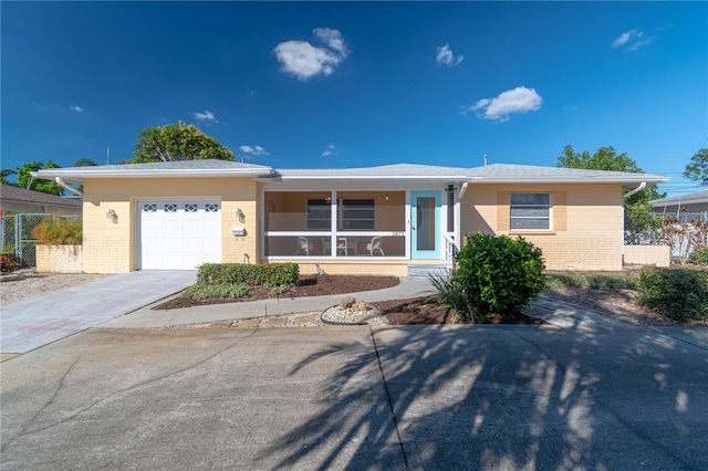 single story home featuring a garage