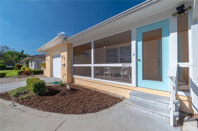 entrance to property with a garage