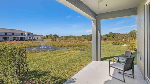 view of yard with a water view