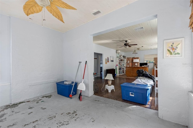 interior space featuring ceiling fan