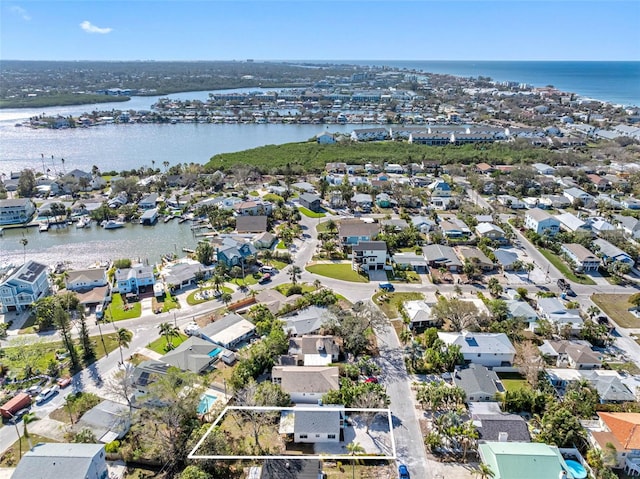 drone / aerial view featuring a water view