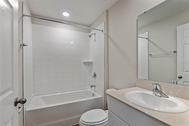 full bathroom with washtub / shower combination, vanity, and toilet