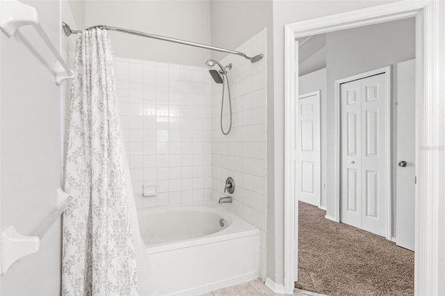 bathroom with shower / tub combo with curtain