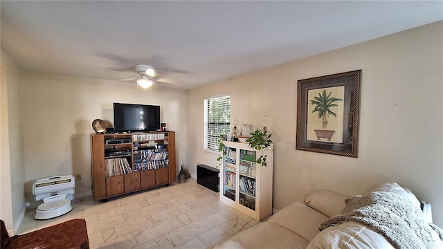 living room featuring ceiling fan