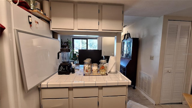 kitchen with tile countertops