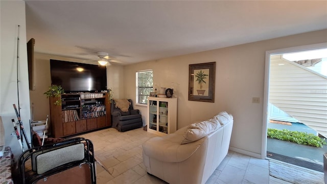 living room with ceiling fan