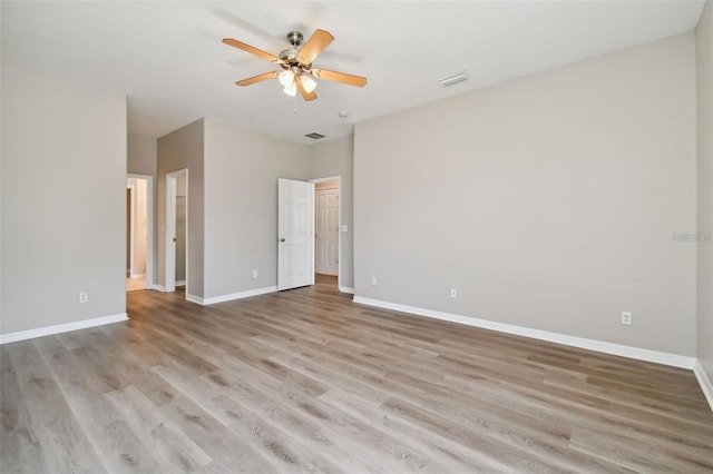 unfurnished bedroom with ceiling fan and light hardwood / wood-style floors