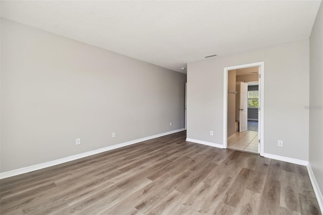 empty room featuring light hardwood / wood-style floors