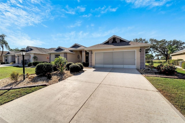 ranch-style house with a front yard and a garage