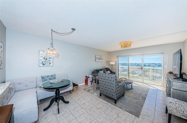 tiled living room with a textured ceiling