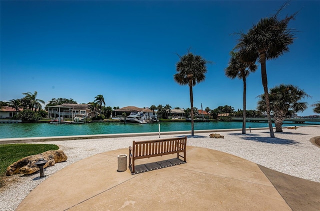 view of pool with a water view