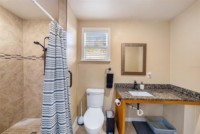 bathroom featuring tile patterned flooring, toilet, walk in shower, and sink