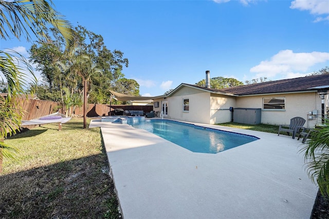 view of pool featuring a patio and a lawn