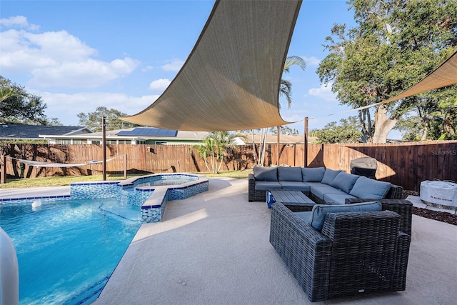 view of pool featuring outdoor lounge area, an in ground hot tub, and a patio