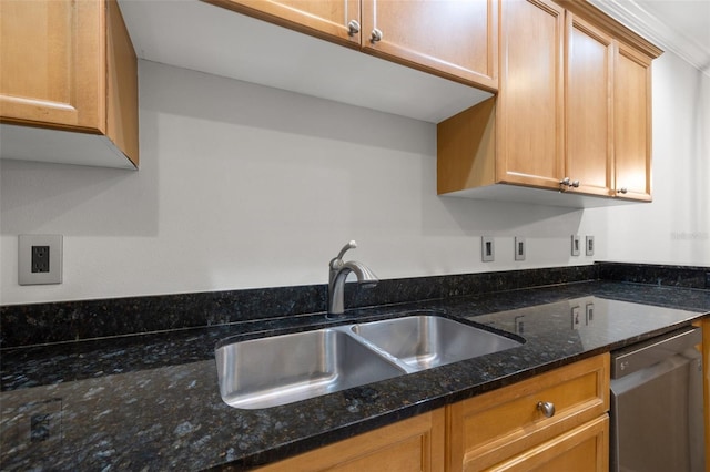 kitchen featuring stainless steel dishwasher, sink, crown molding, and dark stone counters