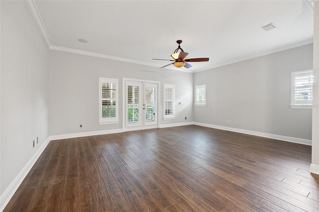 unfurnished room with french doors, ceiling fan, crown molding, and dark wood-type flooring