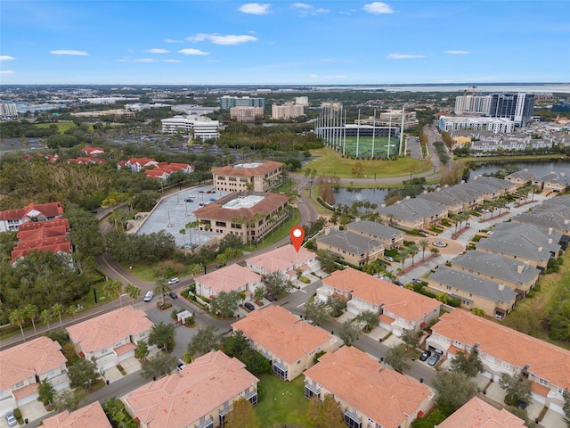 birds eye view of property featuring a water view