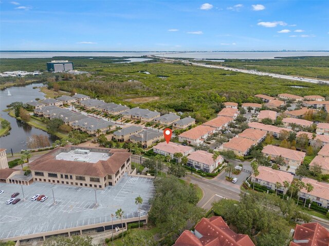 bird's eye view with a water view