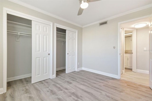 unfurnished bedroom featuring ceiling fan, light hardwood / wood-style floors, and ornamental molding