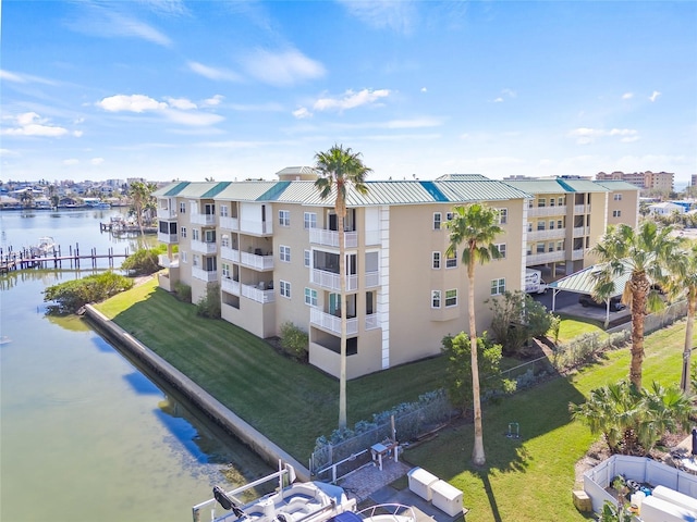 view of building exterior featuring a water view