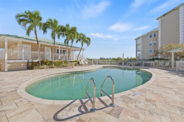 view of pool with a patio