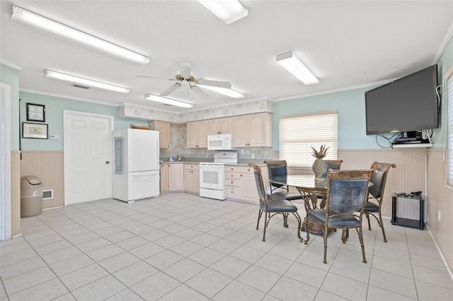 kitchen featuring light brown cabinetry, white appliances, ceiling fan, crown molding, and light tile patterned flooring