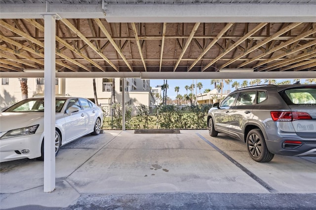 view of parking with a carport