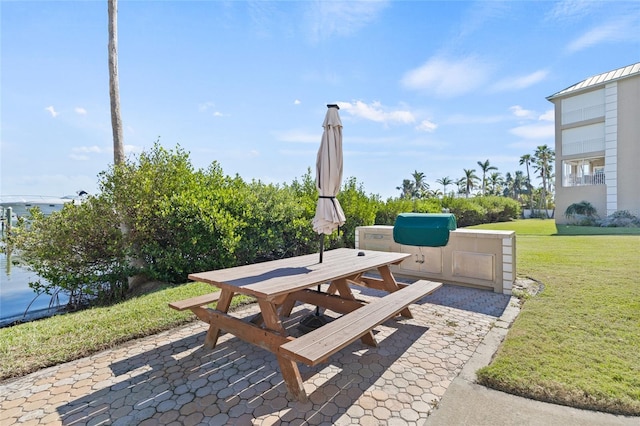 view of patio featuring outdoor dining area