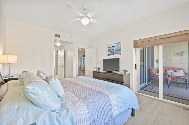 bedroom featuring light wood-style floors, access to outside, visible vents, and ceiling fan