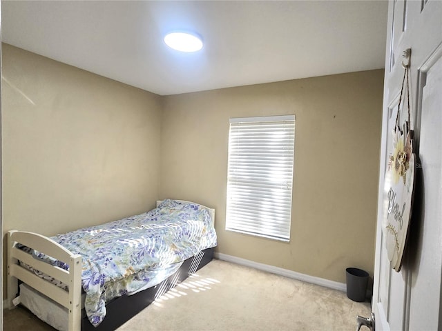 bedroom featuring carpet flooring