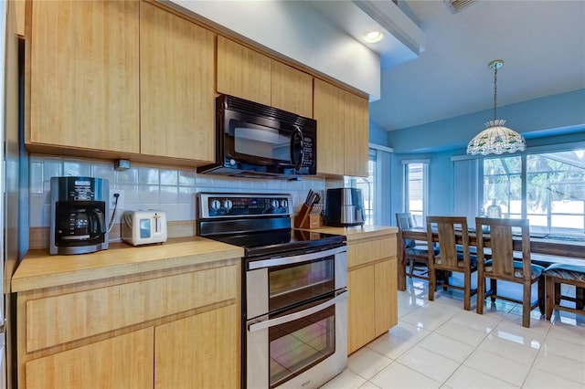 kitchen with backsplash, electric range, decorative light fixtures, an inviting chandelier, and light tile patterned flooring