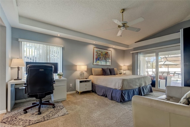 carpeted bedroom with ceiling fan, lofted ceiling, and a textured ceiling