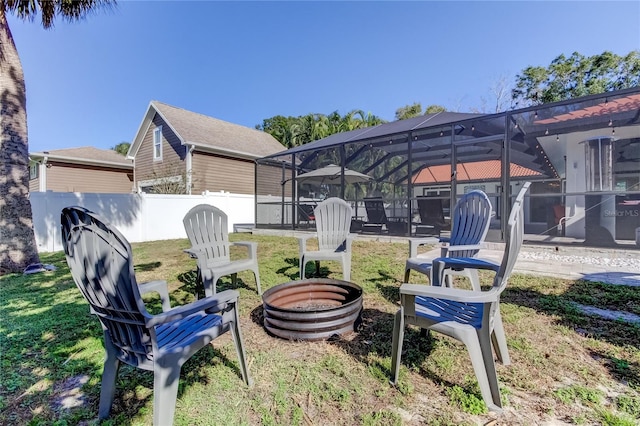 view of yard with a lanai and a patio