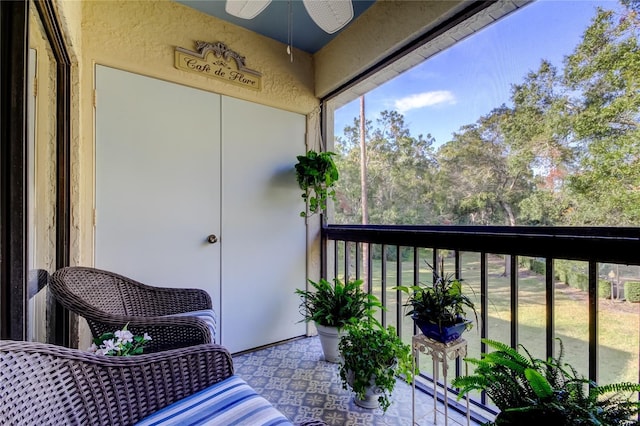 balcony featuring ceiling fan