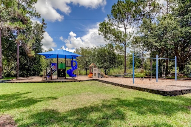 view of playground with a yard