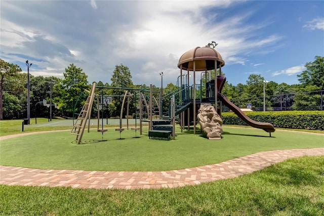 view of play area featuring a lawn